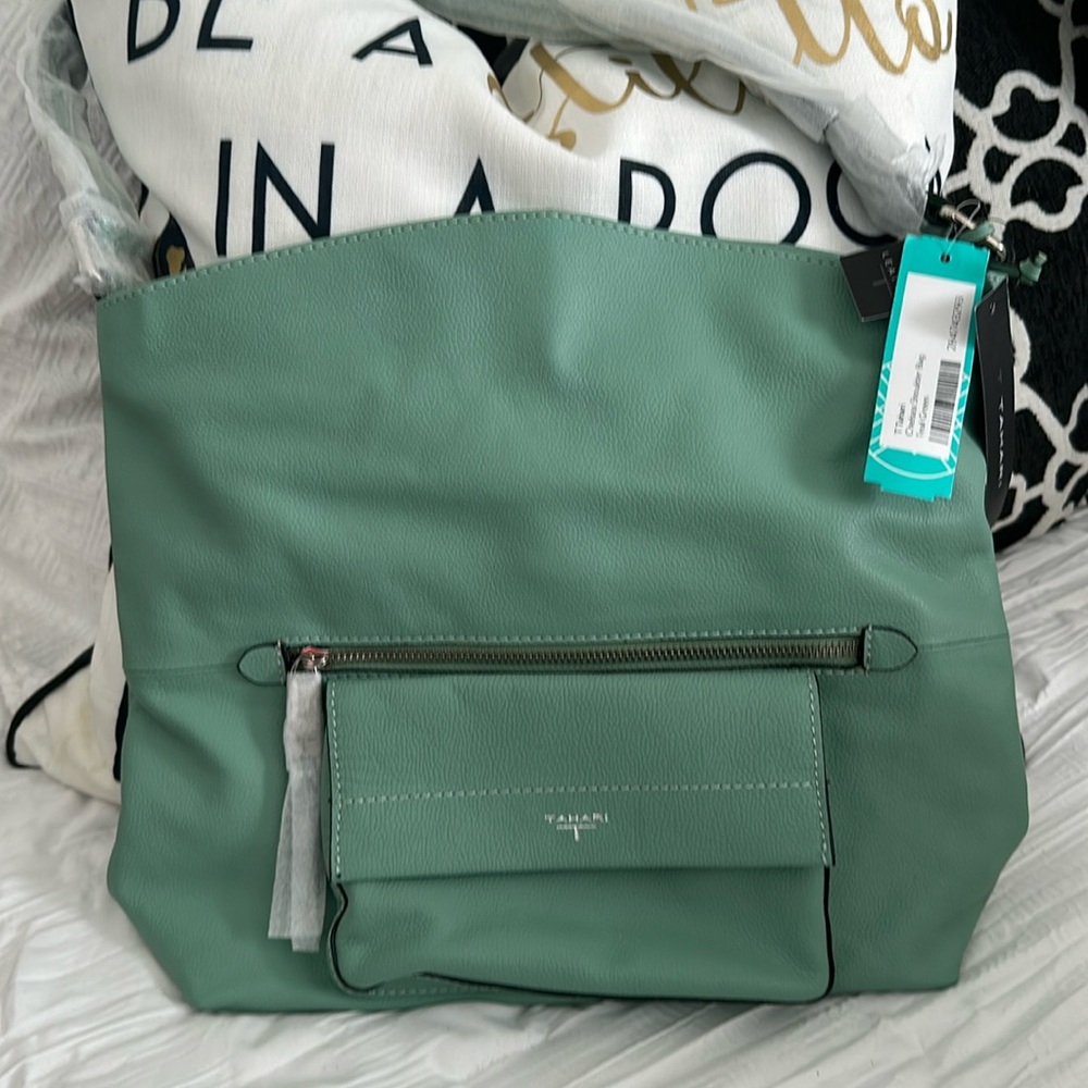 New with tags shoulder bag mint green with zip front pocket and open tab pocket